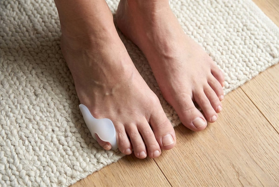 Gel pinky toe corrector worn on the little toe